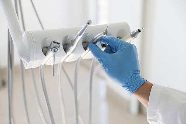 Professional Tooth Extraction technician working in Jeffersonville, KY
